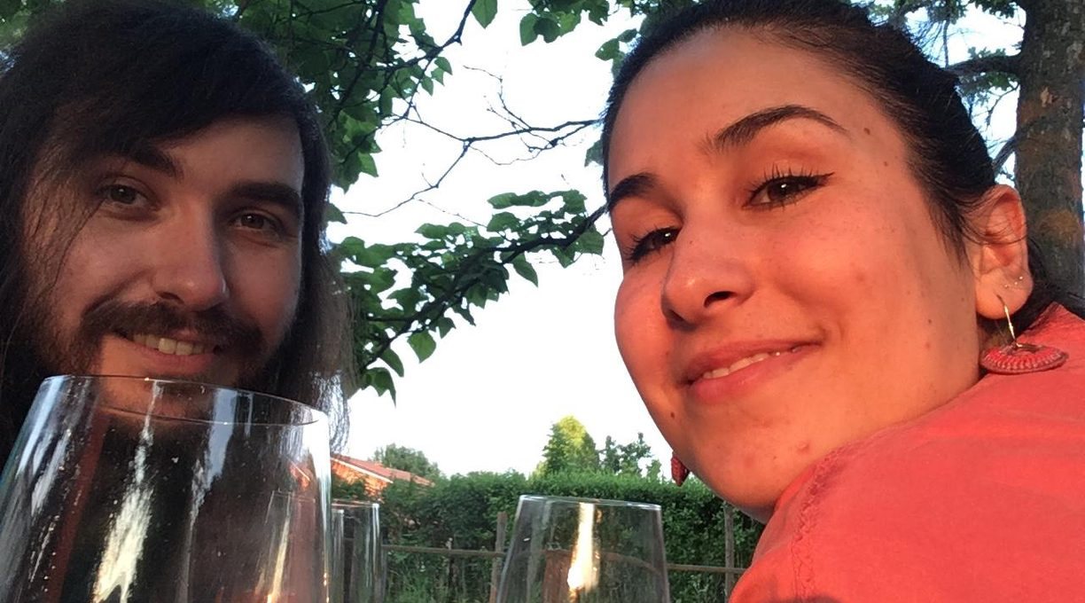 Giulia and Steve having drinks outdoors